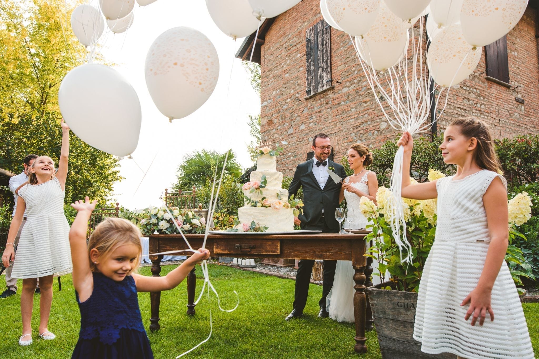 Paolo Lamperti Fotografo Photographer Reportage Matrimonio Camp di Cent Pertigh ricevimento taglio torta nuziale